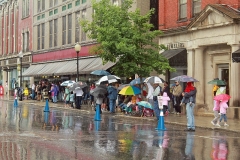 Rain didn't stop these parade watchers.