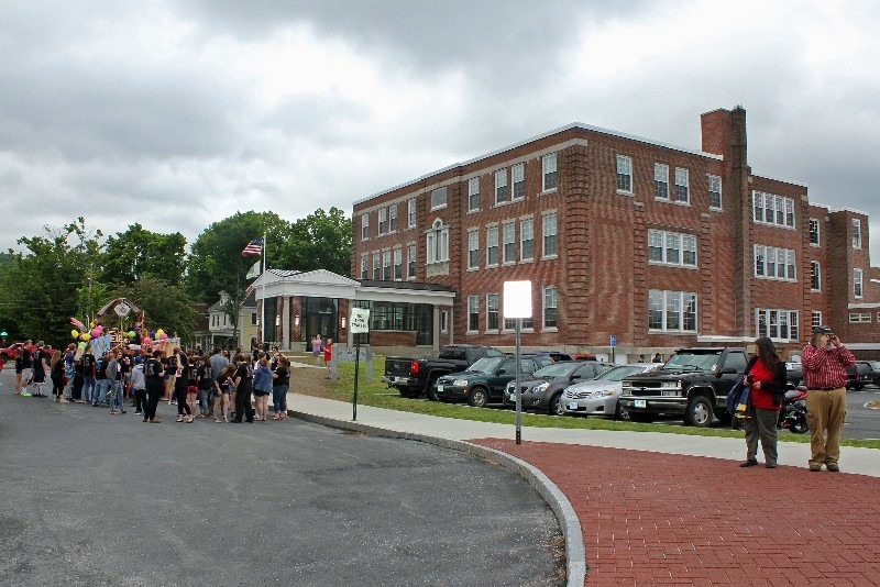 The class of 2015 in front of the new renovated Stevens High School.