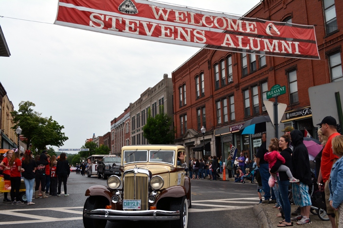 Class of 1932 graduate Helen Lovell rides in a vintage 1932 Chrysler as the vehicle passes underneath the Stevens Alumni banner on Pleasant Street during the 2016 Alumni parade.  At age 102, she is the oldest active member of the alumni.  (1/250 sec., F8, automatic-no flash mode, ISO 200, 24mm).Photo: Stephen C. Fitch   June 11, 2016   11:21 AM