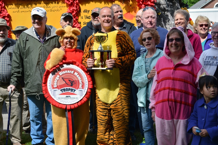Members of the class of 1971 pose beside their Winnie the Pooh-themed float, which won the George Disnard Memorial trophy in the 2016 Stevens Alumni parade. The parade theme was Great Books. (1/250 sec., F8, automatic-with flash mode (no flash), ISO 100, 34mm).Photo: Stephen C. Fitch   June 11, 2016   10:09 AM