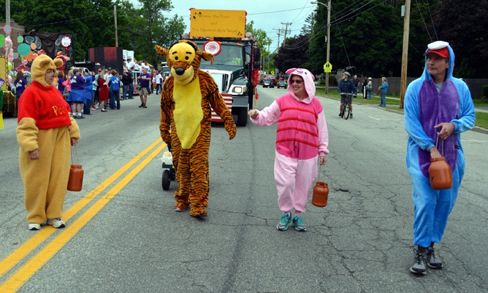 Costumed characters Winnie the Pooh, Tigger, Piglet and Eeyore walk in front of their award-winning float near the start of the 2016 Stevens Alumni parade. The parade theme was Great Books.  Designed by the class of 1971, their float was awarded the George Disnard Memorial trophy. (1/250 sec., F8, automatic-no flash mode, ISO 200, 24mm).Photo: Stephen C. Fitch   June 11, 2016   10:46 AM